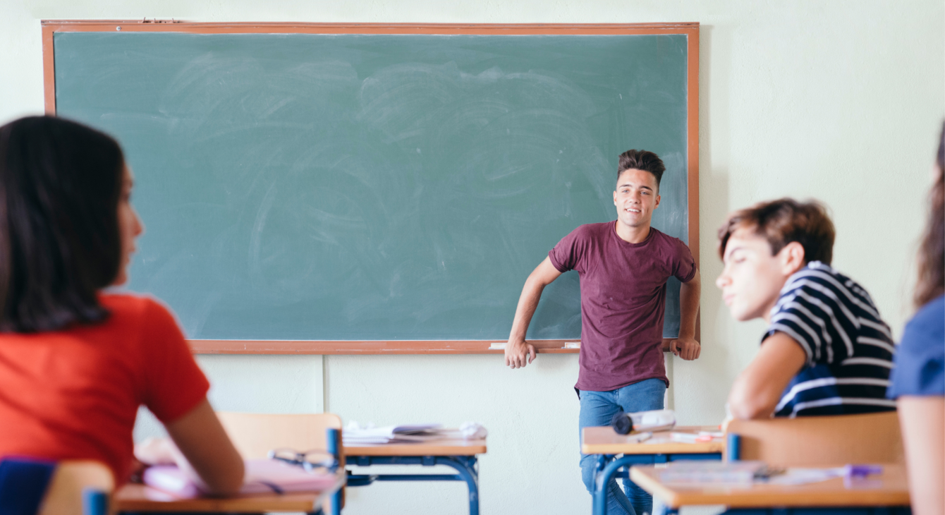student-posing-front-class.jpg